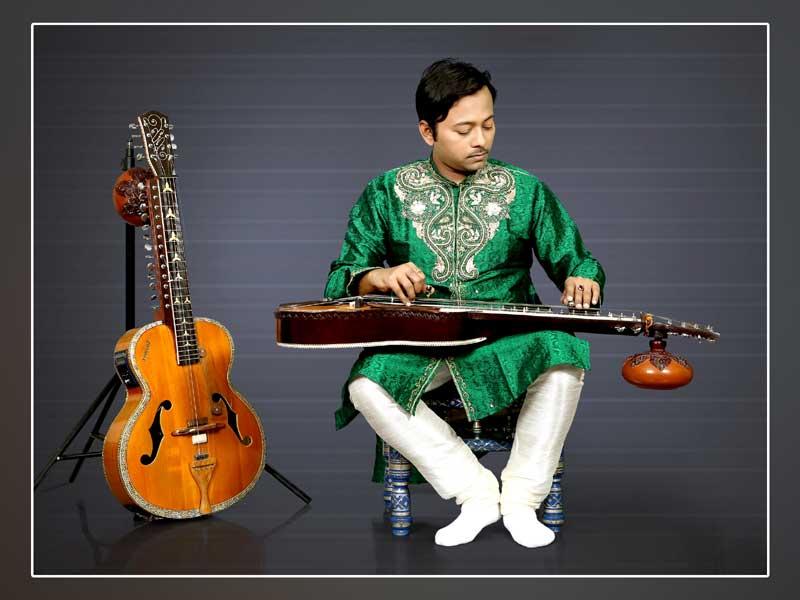 Rhitom Sarkar, slide guitar artist, is keen to take his melody to a wider audience Rhitom Sarkar, slide guitar artist, is keen to take his melody to a wider audience