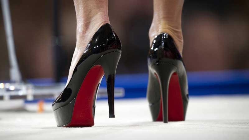 High on heels, low on freedom High on heels, low on freedom